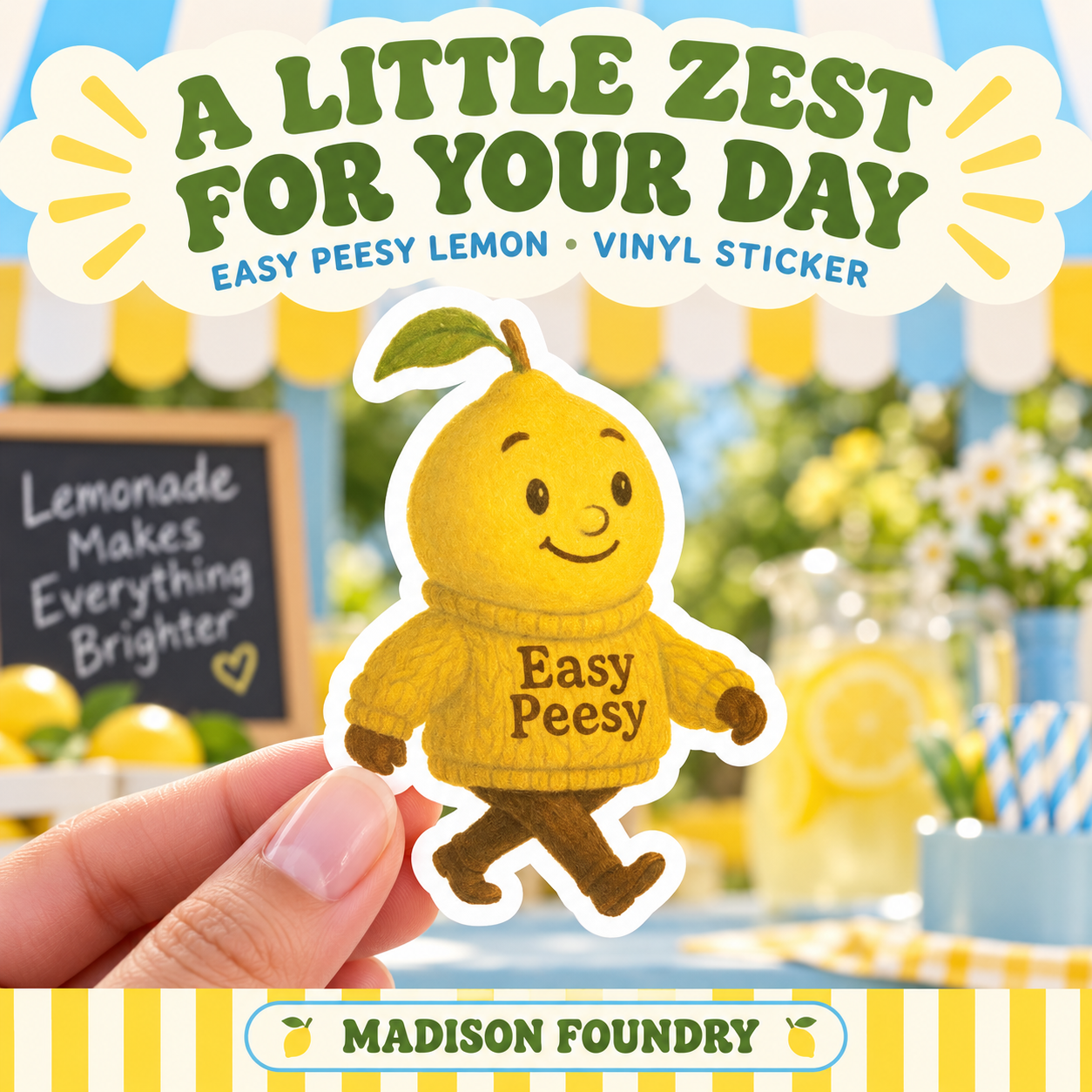 Hand-held smiling Easy Peesy lemon vinyl sticker at a sunny blue and yellow lemonade stand.