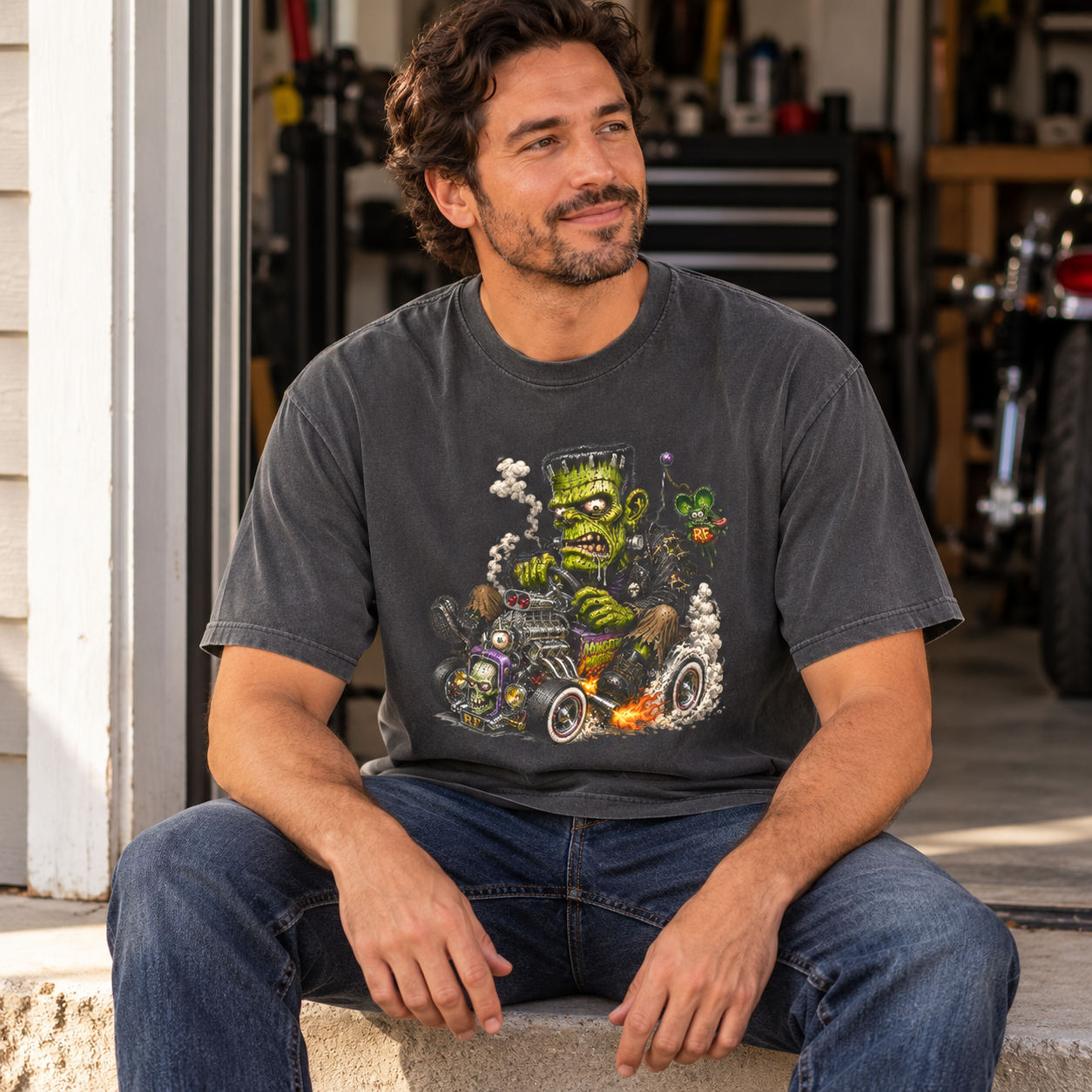 Frankenstein Hot Rod charcoal tee — man relaxing at a garage doorway